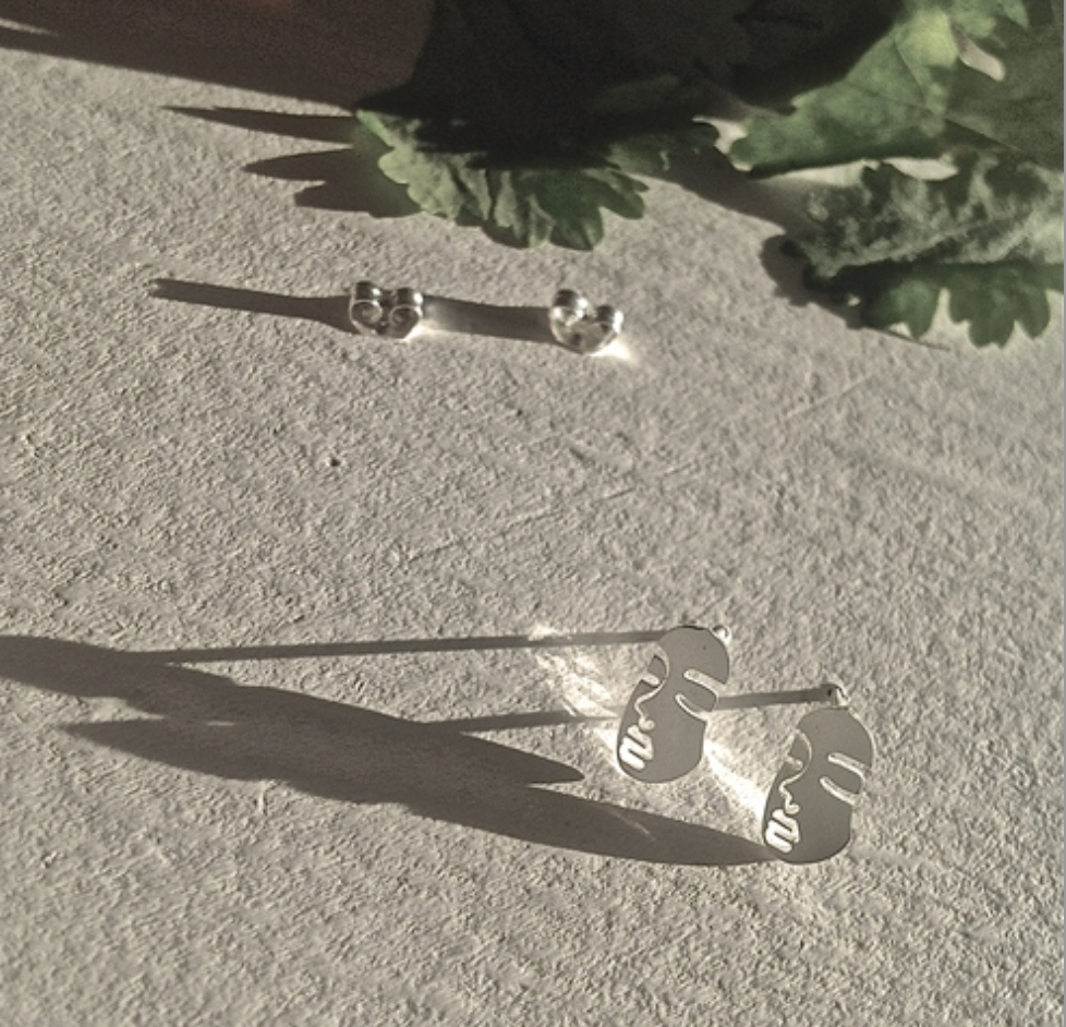 Vogue Feminine Face Silhouette Stud Earrings Silver