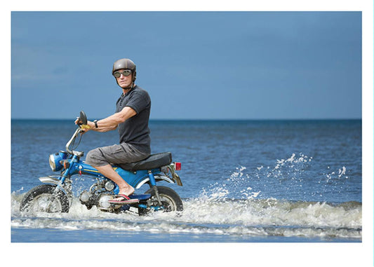 Man On Scooter In Water Card