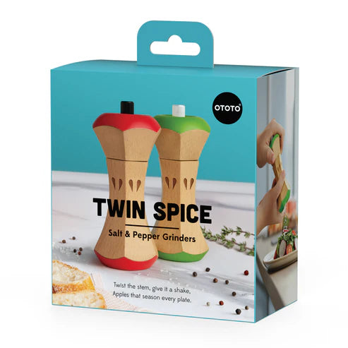 Box of twin spice salt and pepper grinders with a blue background
