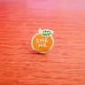@176 Pronoun Orange Pin -She / He