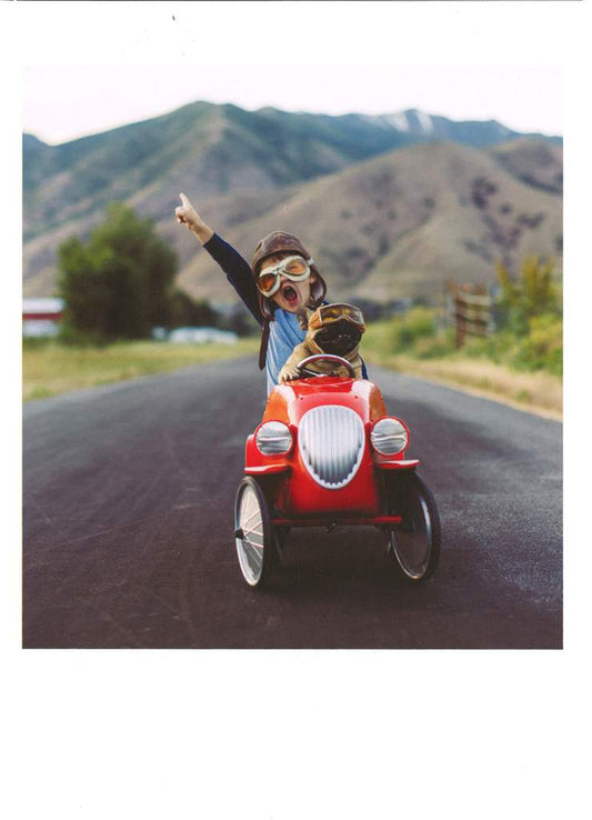 Boy And Dog In Toy Racing Car Birthday Card